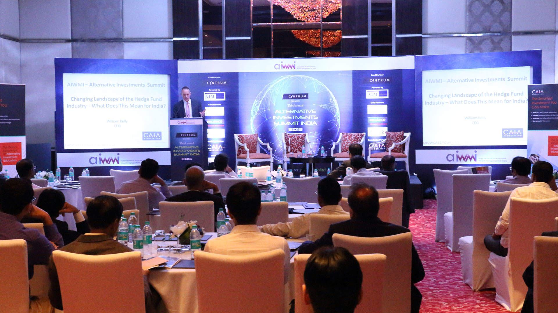 Corporate ballroom with stage and screens