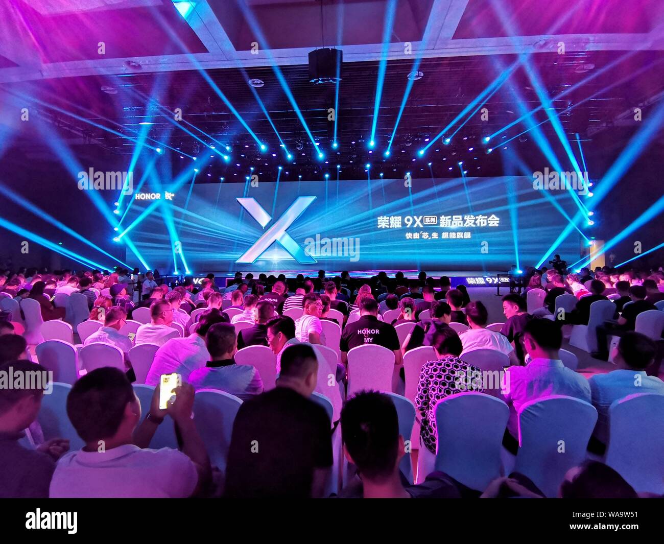 Stage reveal with dramatic lighting